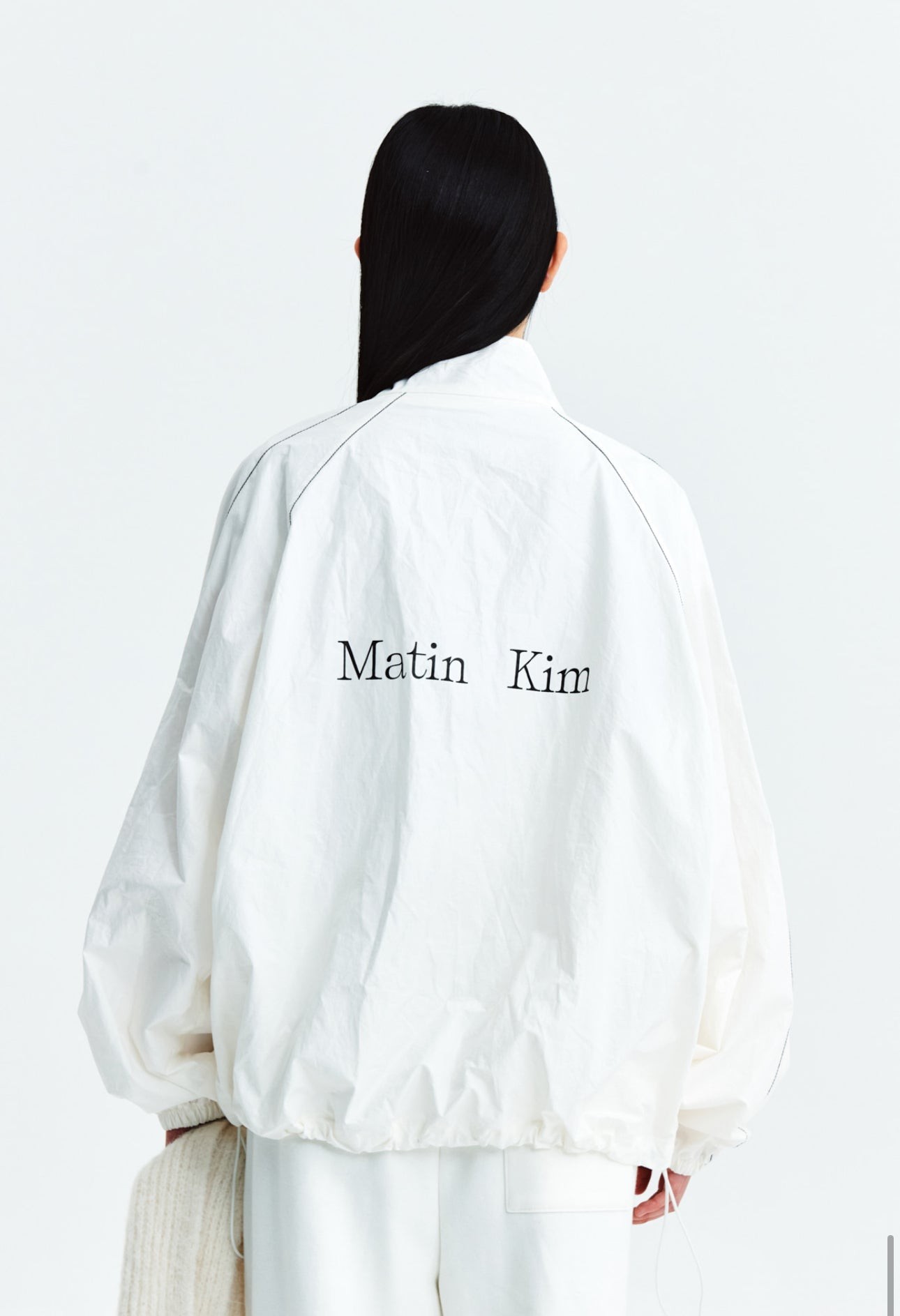 MATIN KIM LOGO COATING JUMPER IN IVORY
